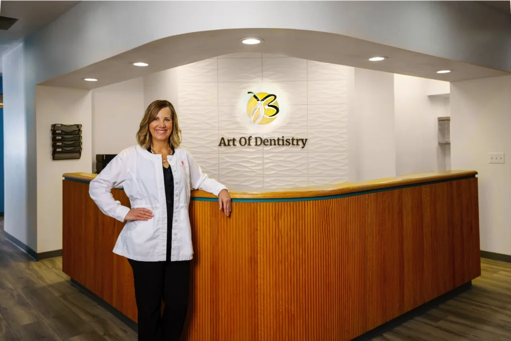The image shows the reception area of a dental office named