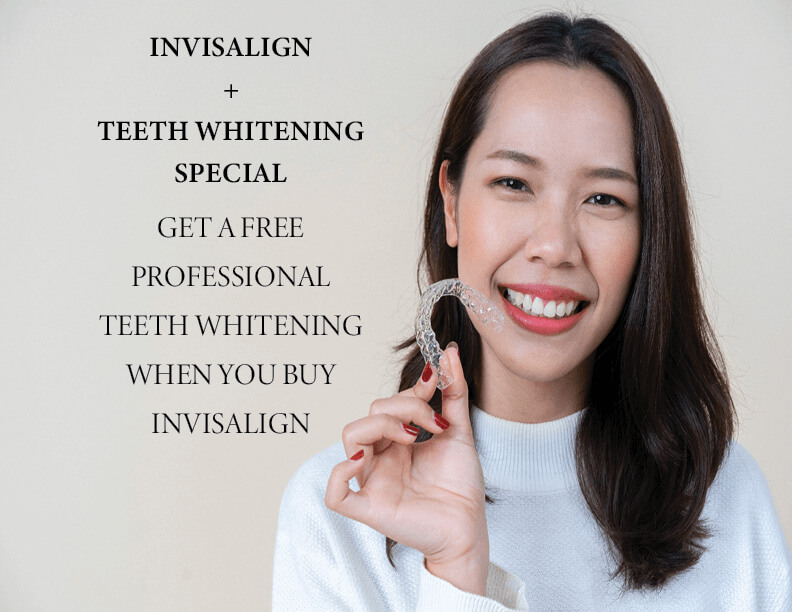woman holding invisalign aligner and smiling