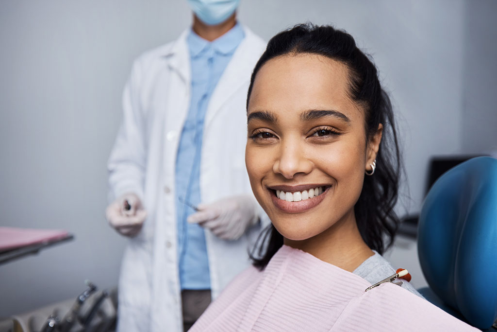 picture of woman smiling in dental chair